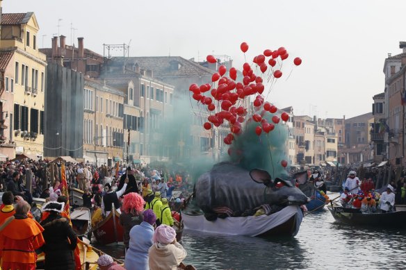 Carnival explodes with music and colour in Venice during winter.