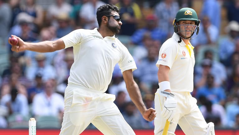 Marcus Harris looks on as Ravichandran Ashwin comes in to bowl.