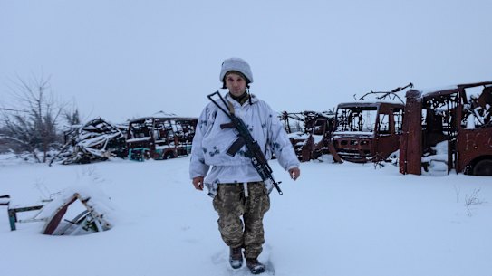 A Ukranian solider walks the line of separation from pro-Russian rebels in Donetsk. 