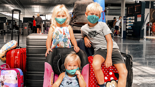 Mila, 4, Max, 7 and Daisy Pope, 2 at Bodrum Airport, Turkey.