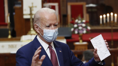 Democratic presidential candidate, former Vice President Joe Biden holds his notes as he speaks to members of the clergy and community leaders at Bethel AME Church in Wilmington, Delaware. 