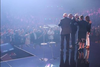 Australian Prime Minister Scott Morrison receives a blessing at the Australian Christian Churches Conference.
