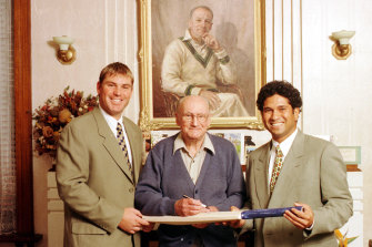 Shane Warne and Sachin  Tendulkar with Sir Donald Bradman at a 90th birthday celebration at his home. 