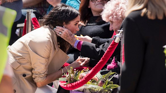 Meghan, the Duchess of Sussex, greets Daphne Dunne outside the Opera House in Sydney last year.