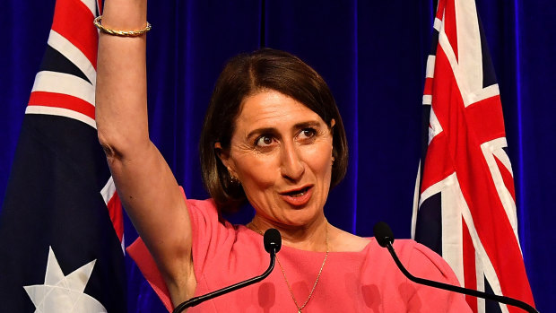 NSW Premier Gladys Berejiklian celebrates victory on Saturday night. 