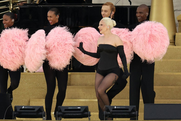 Lady Gaga performs amid a cloud of pom poms.