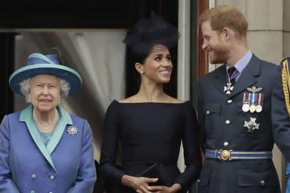 Queen Elizabeth II, with Meghan and Prince Harry in 2018. The Sussexes insist they rang the Queen to ask her about their daughter’s name shortly after the birth. 