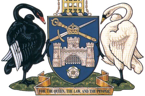 Canberra city's coat of arms includes mediaeval imagery, while the black and white swans holding its shield represents Indigenous people and white Europeans.