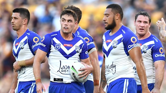 Dejected Bulldogs players during the defeat to the Broncos.