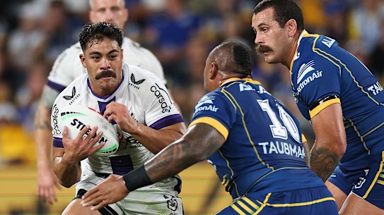 Young Tonumaipea runs at Junior Paulo.