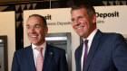 Former premier Mike Baird, pictured with former NAB chief Andrew Thorburn, upon joining the bank in April 2017.