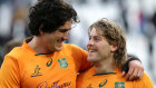 Australia’s Darcy Swain, left, and Fraser McReight enjoy the win.