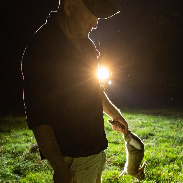 Russell Barnes with a freshly shot rabbit.