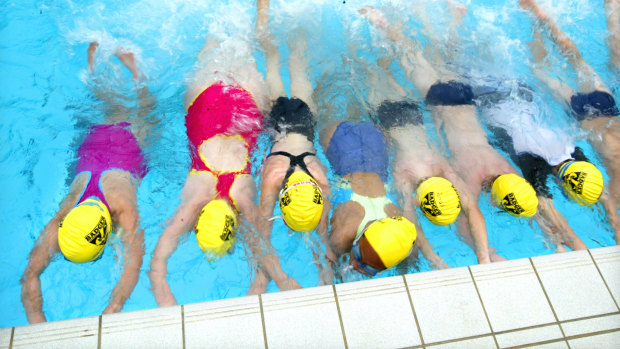 Children should continue swimming lessons between age eight and 12 to achieve recommended skills.