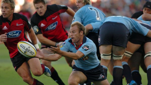 Super days: Chris Whitaker clears the ball from a Waratahs scrum against the Crusaders.