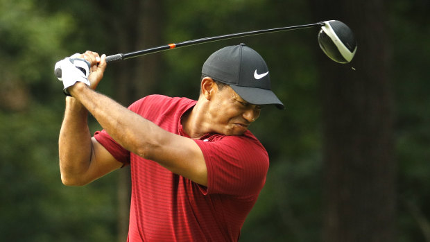Tiger shows his frustration after an errant drive on the 17th hole.