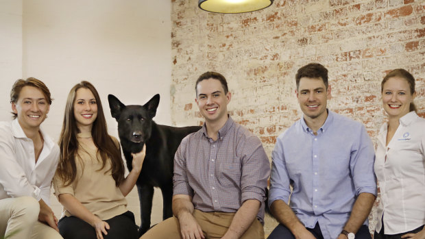 Elliot Smith (centre) and the Maxwell Plus team from the Brisbane medical technology startup.