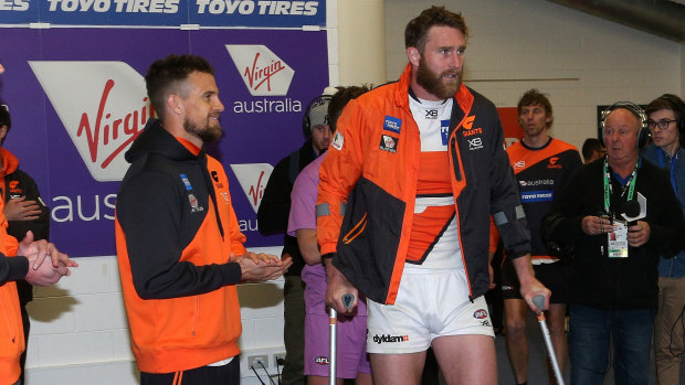 Brett Deledio (centre) and Dawson Simpson (right) are among the Giants' walking wounded.