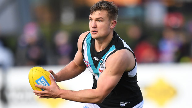 Ollie Wines signed a on long-term deal with Port Adelaide in 2018.