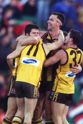 Paul Salmon celebrates with team mates.