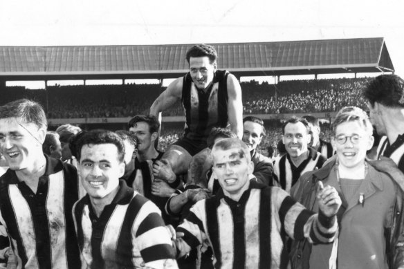 Teammates carry Weideman off after Collingwood’s victory over Melbourne in the 1958 VFL grand final.