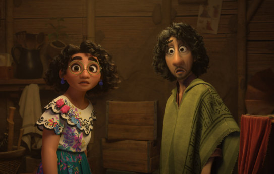 Mirabel, voiced by Stephanie Beatriz, and Bruno, voiced by John Leguizamo, in a scene from Encanto.