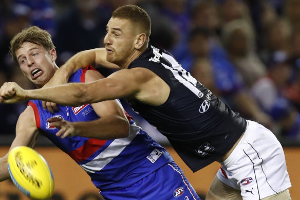 Liam Jones (right) and Mitch Hannan will be teammates at the Western Bulldogs.