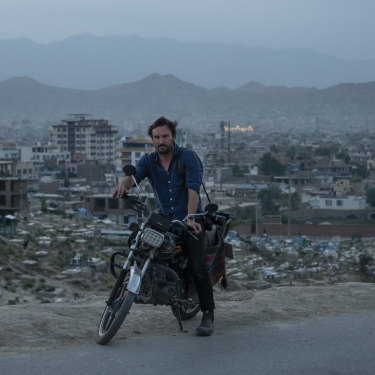 Afghanistan “became my identity”, says Andrew Quilty, pictured in front of Kabul’s Wazir Abad cemetery. 