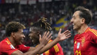 Spain’s Mikel Oyarzabal, right, celebrates with Nico Williams and Lamine Yamal, left, after scoring his side’s second goal during the final match between Spain and England at the Euro 2024 soccer tournament . 