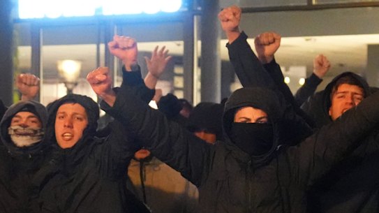 Right-wing demonstrators shout at people protesting against the victory of Geert Wilders in the Dutch general election on Thursday.