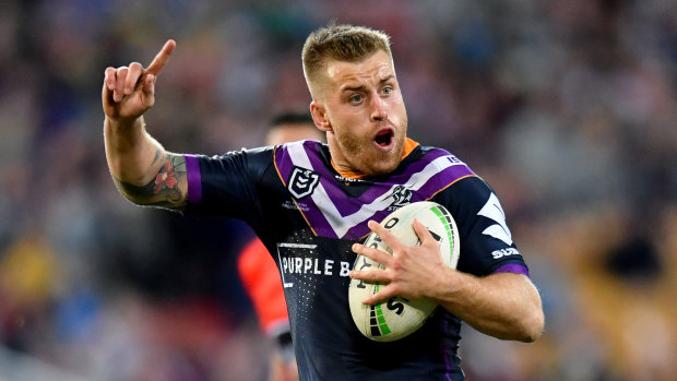 Too good: Melbourne's Cameron Munster celebrates against the Eels.
