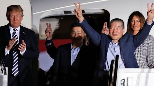 Donald Trump welcomes back three US prisoners released from detention in North Korea.