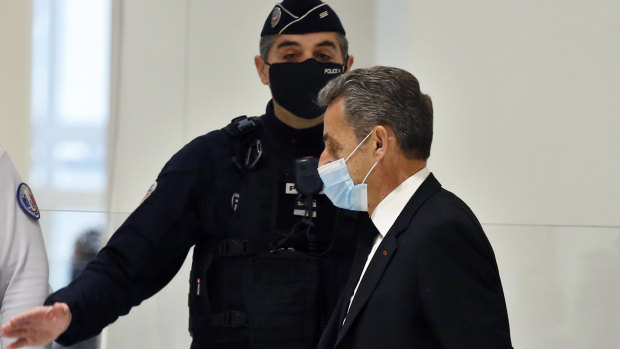 Former French president Nicolas Sarkozy arrives at the courtroom  in Paris on Monday.