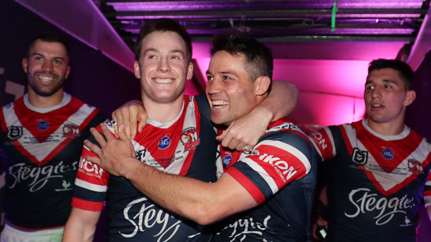 Luke Keary with Cooper Cronk after winning the 2019 Grand Final with the Roosters. 