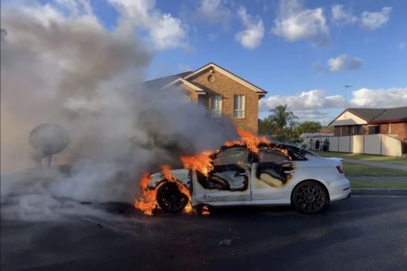 The burning Audi in Bathurst Street, Wakeley.