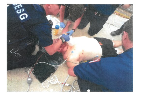 Tony Mokbel being treated after the near-fatal attack in 2019. 