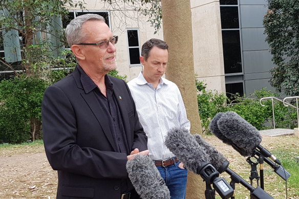 UQ scientists Professor Paul Young (left) and Professor Trent Munro in December 2020 announcing the vaccine was being halted.