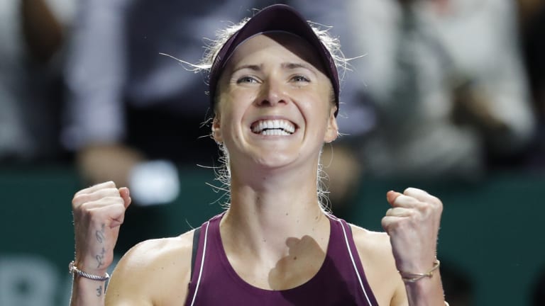 Elina Svitolina celebrates her win over Caroline Wozniacki.