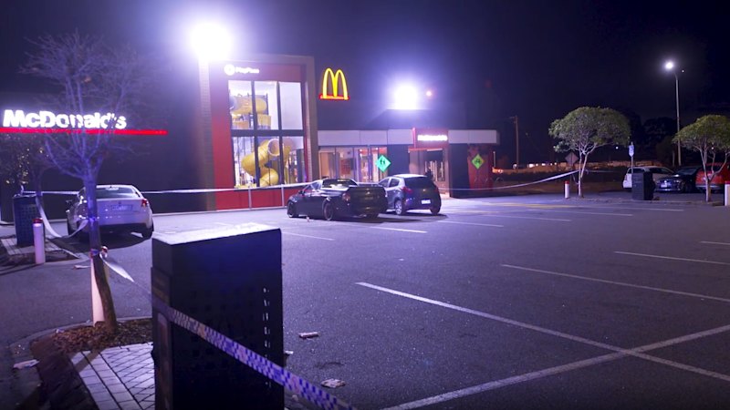 Two injured, man arrested after double stabbing in McDonald’s car park