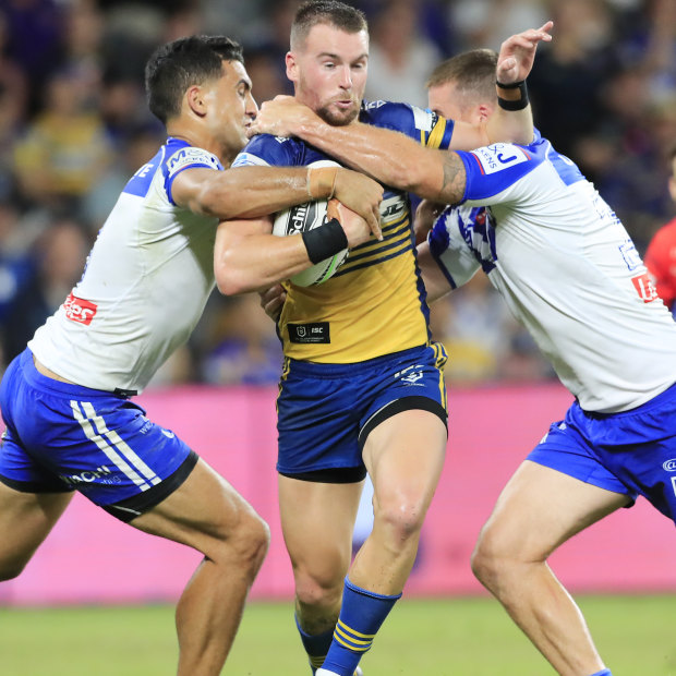 Parramatta captain Clint Gutherson takes on the Bulldogs defence in round one.