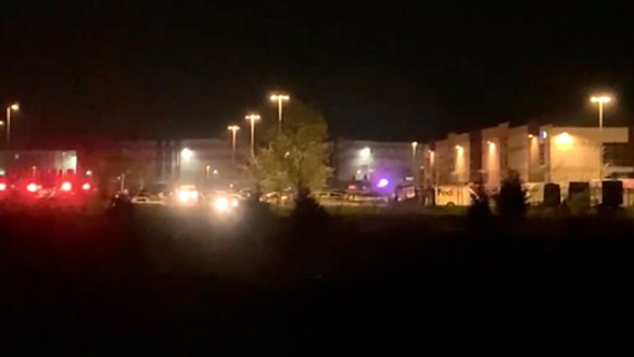 Emergency vehicles attend the scene of the shooting in Indianapolis.