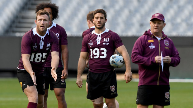 Queensland Maroons arrive for their Captain's Run session at the MCG.