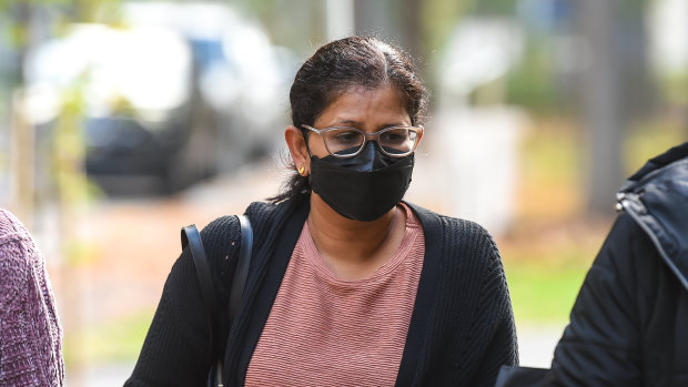 Nurse Atheana George arrives at the Coroners Court of Victoria on Thursday.