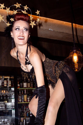 Burlesque dancer performing at the Employees Only first birthday. 