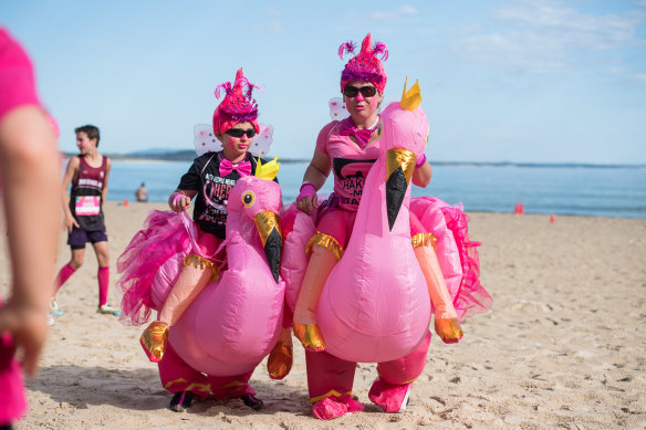 Participants don their bubblegum-tinged best for the Noosa Triathlon Breakfast Fun Run.