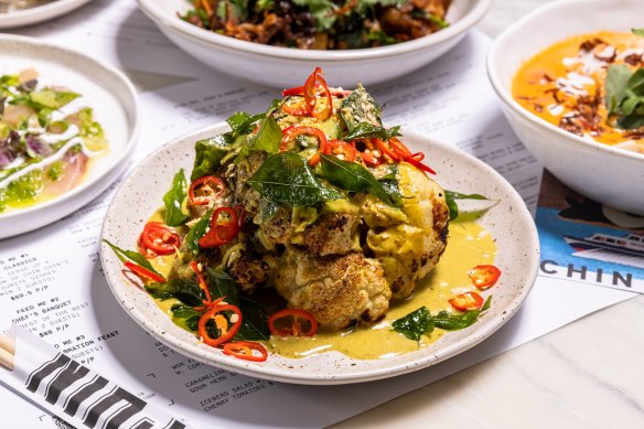Roasted cauliflower with curry-spiced coconut cream.