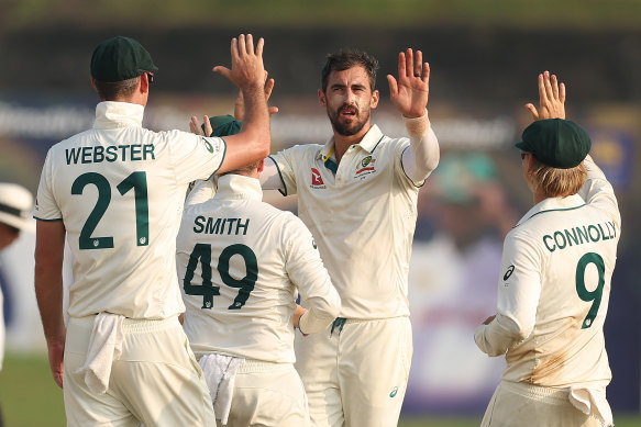 Mitchell Starc celebrates the wicket of Prabath Jayasuriya.