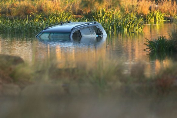 Akon Guode's car in the lake.