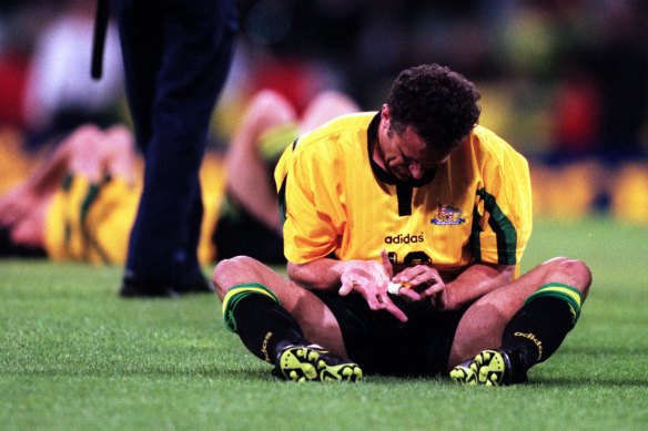 Graham Arnold cut a shattered figure after Australia’s 2-2 draw with Iran in 1997 - his last match for his country.