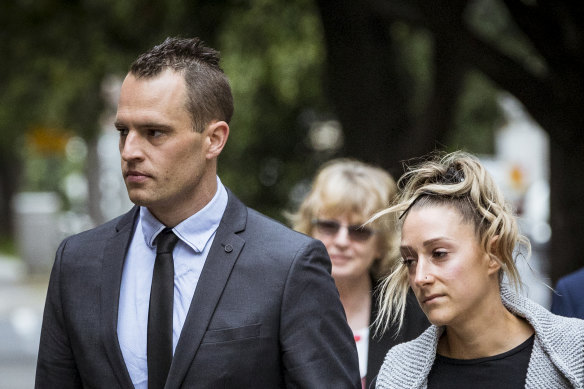 Critical Incident Response Team police member Roland Jones (left) arrives at the inquest on Thursday morning.